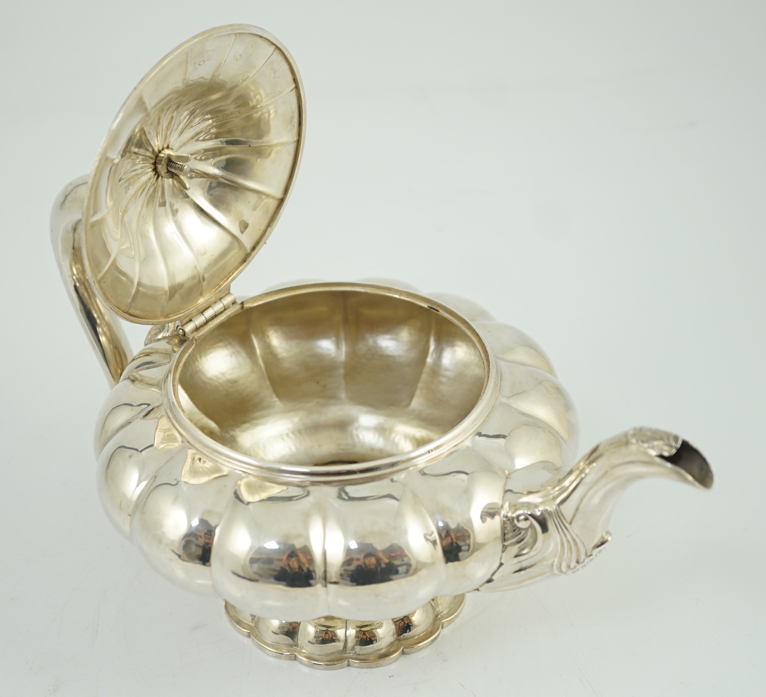A George IV silver melon shaped pedestal teapot, by Joseph Angell I
